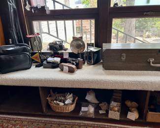 Vintage cameras and accessories seashells and Swift telescope