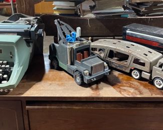 VINTAGE TOY TRUCKS & TYPEWRITER