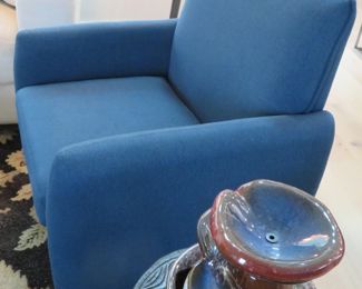 One of two blue occasional chairs