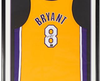 169
2000
An Autographed Kobe Bryant (1978-2020) Los Angeles Lakers Framed Jersey
A framed yellow mesh jersey, with the patches "Bryant 8" on the verso; signed in black Sharpie and with the Mounted Memories hologram seal, both on the number 8 patch, verso
Chest: 25.5"; Length: 32.75"
Estimate: $8,000 - $10,000