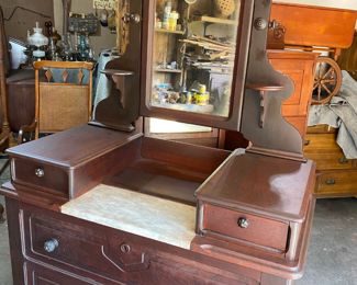 Marble top Dresser with glove drawers and candle holders 1890's