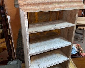 primitive shelf with tin roof