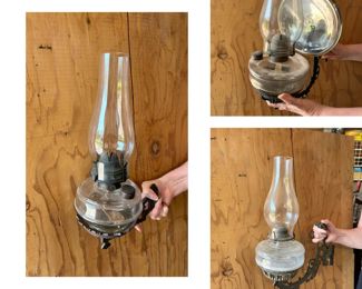 Early oil lamps with wall mount brackets. 1 with mercury reflector