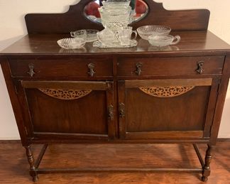 antique server with mirrored backboard and filigree decoration