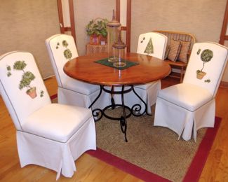 Handpainted topiaries on skirted dining chairs