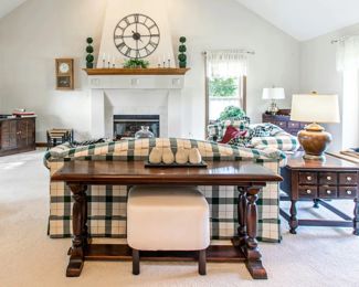 Ethan Allen and Plunkett furniture abounds