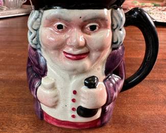 Shorter (England) toby jug with purple jacket 4"H