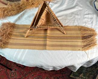 Rectangular fringed grass mat and nesting triangular baskets (largest is 12") from Congo, mid-century 