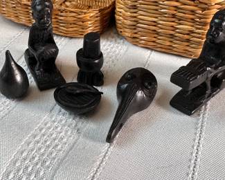 Miniature hand carved ebony wood figures in woven 1.5"H basket 