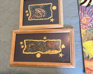 Framed prints of colorful ocean life, largest has a cracked glass, frame measures 10" x 16"
