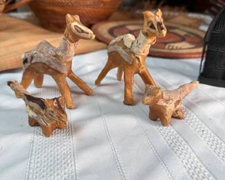 Small forest animal figurines in hide from the Congo, mid-century 3"H