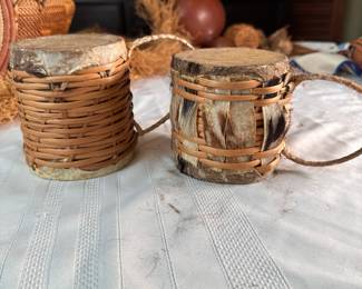 Pair of small drums made with hide and basketry (some of the remaining fur is shedding, otherwise sturdy and intact) 4"H