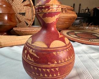 Gourd bottle carved in relief, (lid is taped to hold in place) from the Congo, mid-century 6"H