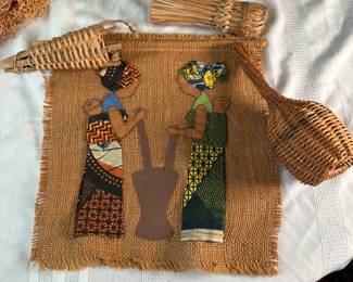 Woven wall hanging 12" x 12" with traditional women in fabric mixing a pot shape in leather, plus woven cone-shaped basket, brush and rattle