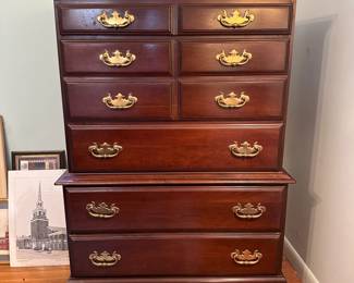 Tall chest with 5 drawers, bat wing brass color pulls, drawers open smoothly, minimal wear 48"H x 36"W x 18"D