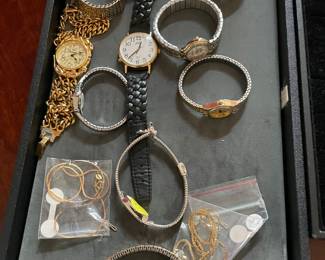 14 karat gold necklaces and a variety of men’s and women’s watches