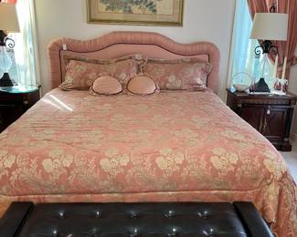 Pink padded headboard and matching bed skirt, comforter and pillows with mattresses and frame. Leather Ashley foot chest
