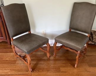 Pair of olive leather chairs