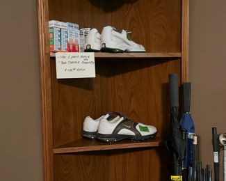 Corner cabinet and golf shoes 