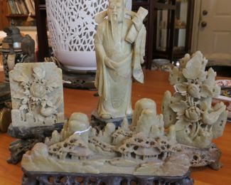 Several carved soapstone figures
