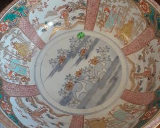 One of a pair of large bowls with unusual outer rims.