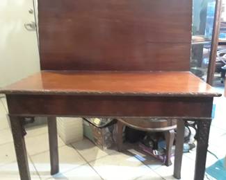 Flip top games table Chippendale style.