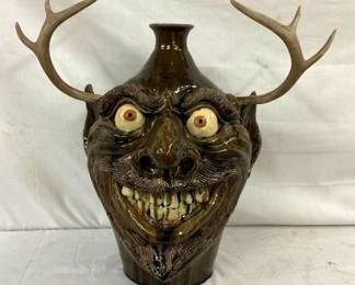 26IN SIGNED FLOWERS FACE JUG