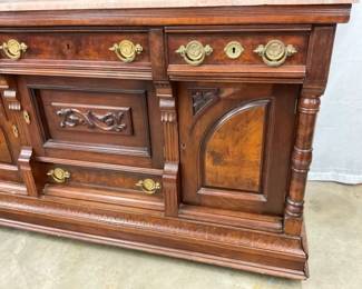 CLOSE UP OF SIDEBOARD BASE 