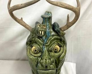 3G. FLOWERS NC FACE JUG W/HORNS