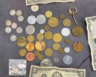 CLOSE UP VIEW SOME FOREIGN COINS