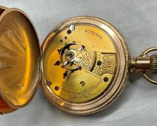 CLOSEUP INSIDE POCKET WATCH
