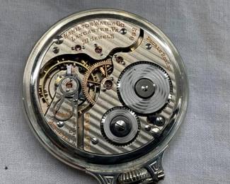 CLOSEUP INSIDE POCKET WATCH