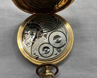 CLOSEUP INSIDE POCKET WATCH