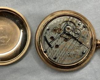 CLOSEUP INSIDE POCKET WATCH
