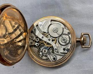 CLOSEUP INSIDE POCKET WATCH