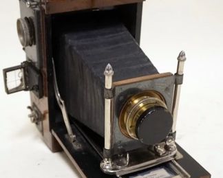 1015	REFLEX CAMERA CORP FOLDING BED CAMERA
