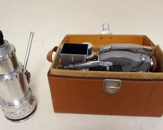 1030	CAMEX 8MM REFLEX MOVIE CAMERA WITH EXTRA LENSES
