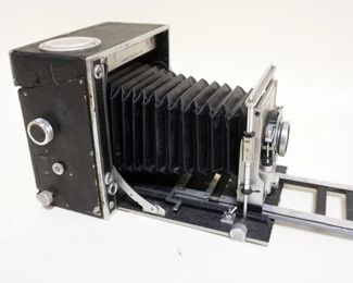 1043	DAWE UNIVERSAL PRESS CAMERA, SHUTTER DAMAGED AND WILL NOT CLOSE

