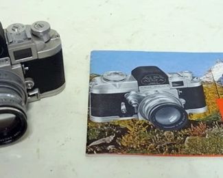 1055	ALPHA REFLEX 35 MM CAMERA, SHUTTER JAMMED
