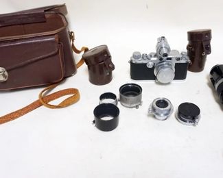 1075	LEICA 3C CAMERA WITH 3 LENSES
