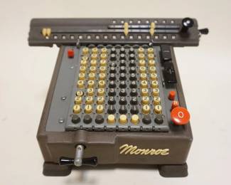 1100	MONROE ADDING MAHINE, MONROE CALCULATING MICHINE CO ORANGE NJ, APPROXIMATELY 7 IN X 10 IN X 7 IN HIGH
