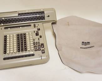 1107	SCM MARCHANT ADDING MACHINE CALCULATOR, APPROXIMATELY 19 IN X 15 IN X 9 IN HIGH
