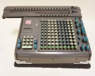 1106	FRIDEN ADDING MACHINE CALCULATOR, APPROXIMATELY 18 IN X 13 1/2 IN X 9 IN HIGH
