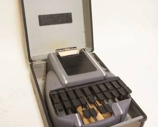 1127	STENOGRAPH MACHINE, APPRROXIMATELY 9 IN X 11 IN X 5 IN
