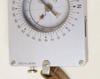 1172	SWISS POCKET COMPASS BUCHY HAAG-STREIT, APPROXIMATELY 2 IN X 2 1/2 IN X 1 IN
