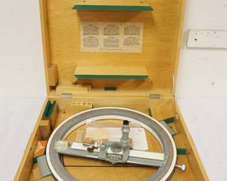 1174	HAAG-STREIT CIRCULAR POLAR CORDINATE PLOTTER, APPROXIMATELY 25 IN X 25 IN X 7 IN
