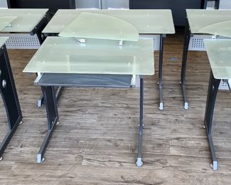 25-27. $75/each -- Three Frosted Glass L-Shape Desks