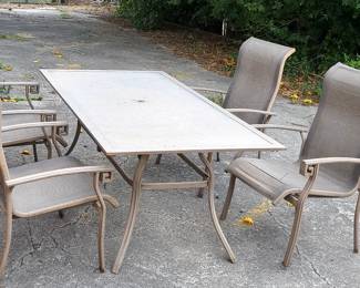 79. $45 -- Outdoor Furniture Table Set with 4 Chairs. Some rust.