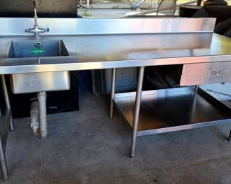 103. $650 [FIRM] -- Stainless Steel Table with Sink, Splash Curb, Drawer, and Shelf -  front