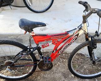 122. $5 -- Red Bike, some rust